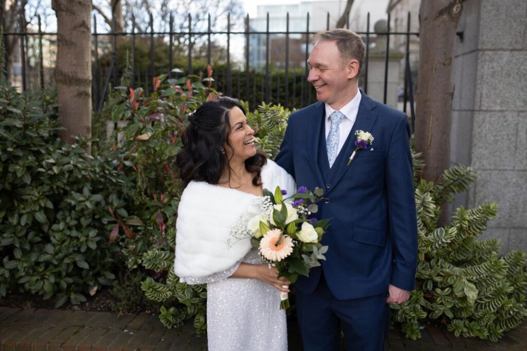 Bride and groom outside Dublin City Hall after civil ceremony