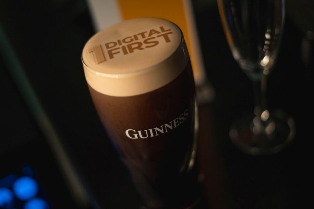 Guests Celebrating With Pints Of Guinness - E17