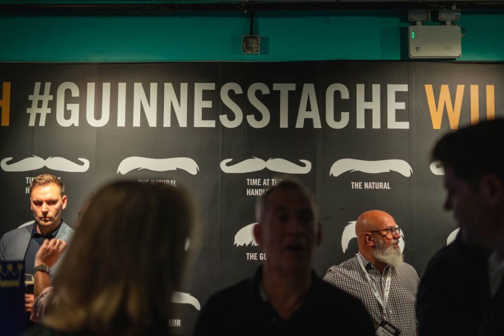 Speaker On Stage With Guinness Storehouse Backdrop - E17