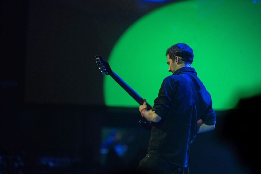 Guitar Player Perfoming At The Gala Awards In Convention Centre In Dublin , Premium Suprise Event Style Entrance Back Photo - E17